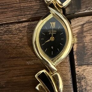 Citizen Gold Tone Watch with Black Dial and Accents